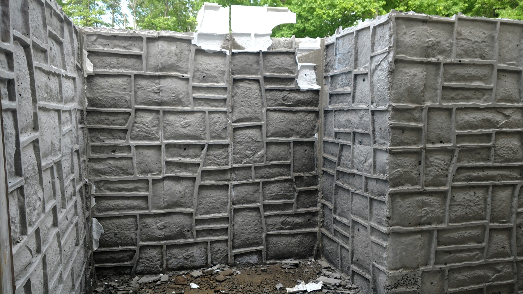 Formed concrete wall construction