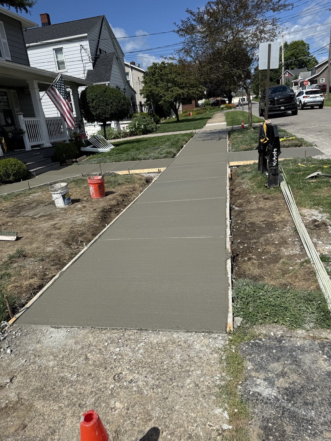 Long newly finished concrete sidewalk