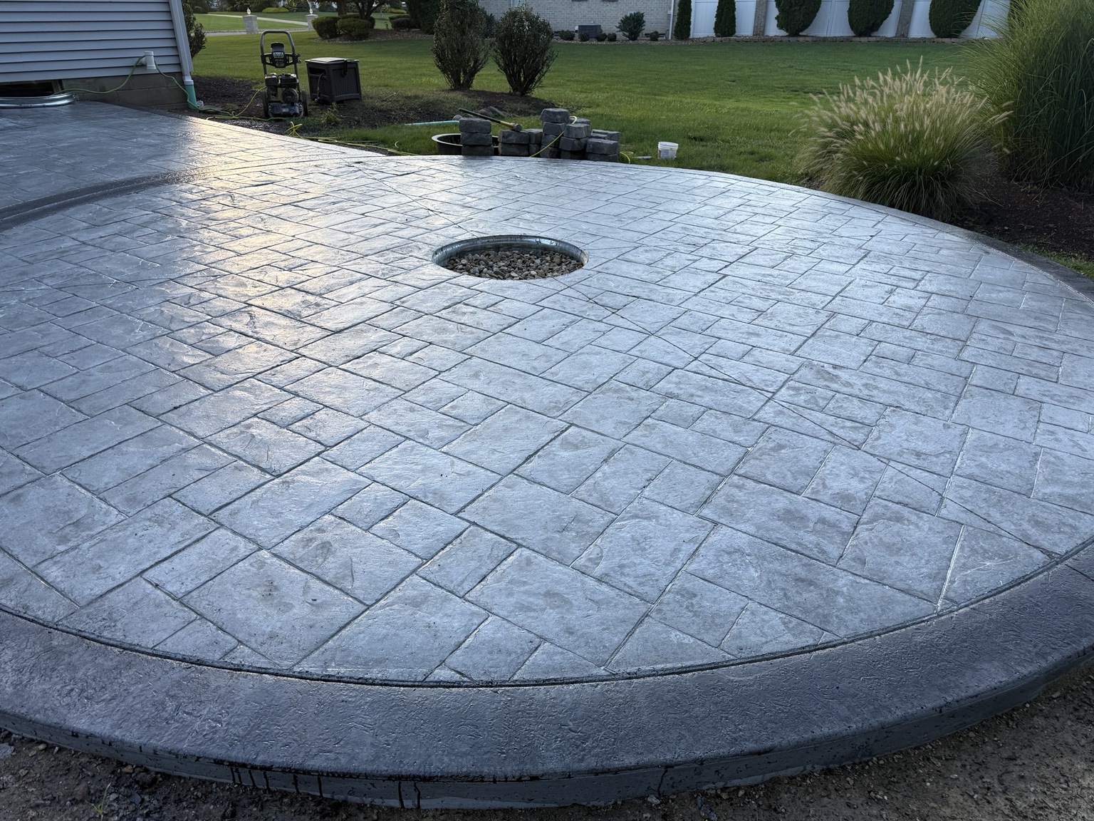 Circular stamped concrete patio area